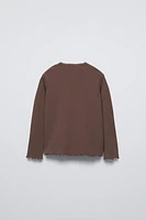 T-SHIRT POINTELLE AVEC NŒUD