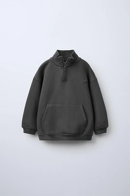 QUARTER ZIP POUCH POCKET SWEATSHIRT