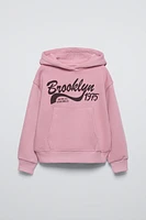 TEXT PRINT HOODED SWEATSHIRT