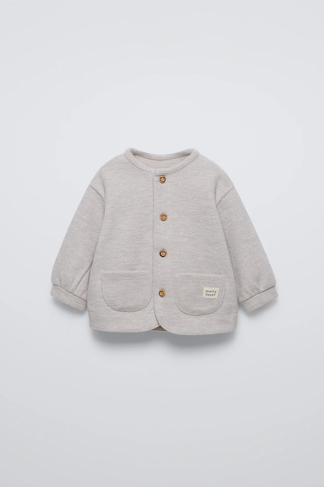 SOFT TOUCH POCKETS SWEATER