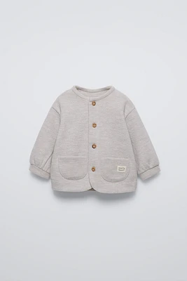 SOFT TOUCH POCKETS SWEATER