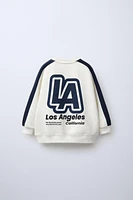 RAISED TEXT STRIPES SWEATSHIRT