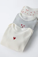 THREE-PACK OF ROUND NECK HEART BODYSUITS