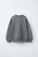 WASHED EFFECT DOLL PRINT SWEATSHIRT