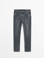 Tapered fit cotton blend jeans