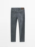 Tapered fit cotton blend jeans