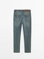 Jean tapered fit en coton