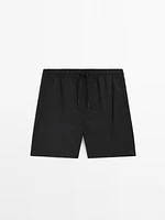 Plain swimming trunks with elastic waistband