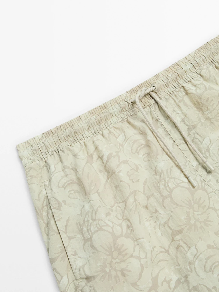 Printed swimming trunks with elastic waistband