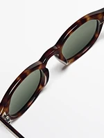 Round tortoiseshell-effect sunglasses