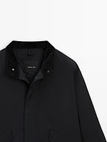 Short parka with corduroy collar detail