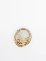 Ring with textured detail