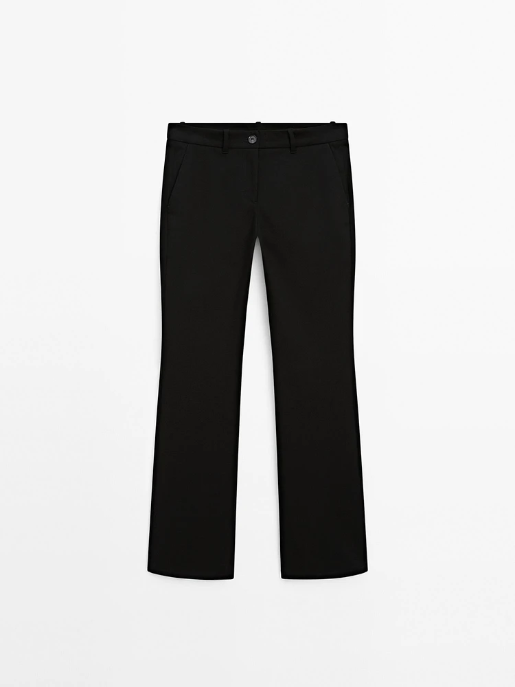 Low-rise slim fit flared trousers