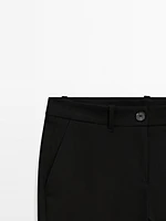 Low-rise slim fit flared trousers