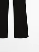 Low-rise slim fit flared trousers