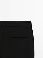 Low-rise slim fit flared trousers