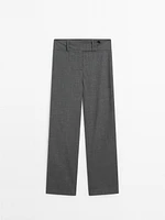 Straight trousers with wide waistband