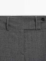 Straight trousers with wide waistband