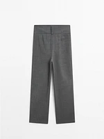 Straight trousers with wide waistband