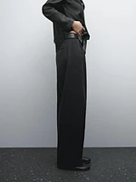 Flowing wide-leg cotton blend trousers with pleats