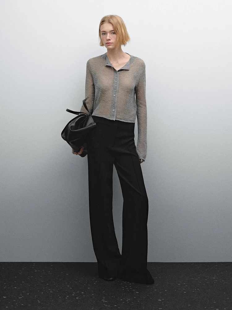 Flared trousers with zip