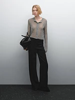 Flared trousers with zip