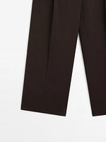 Wide-leg pleated cotton blend trousers