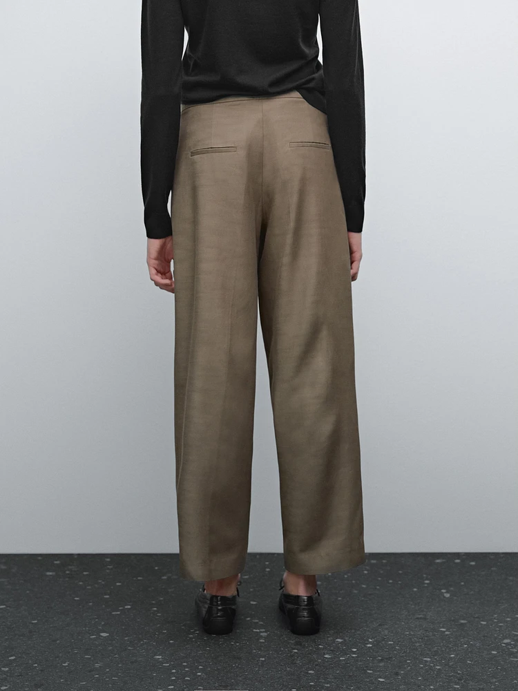 Darted trousers with thin waistband