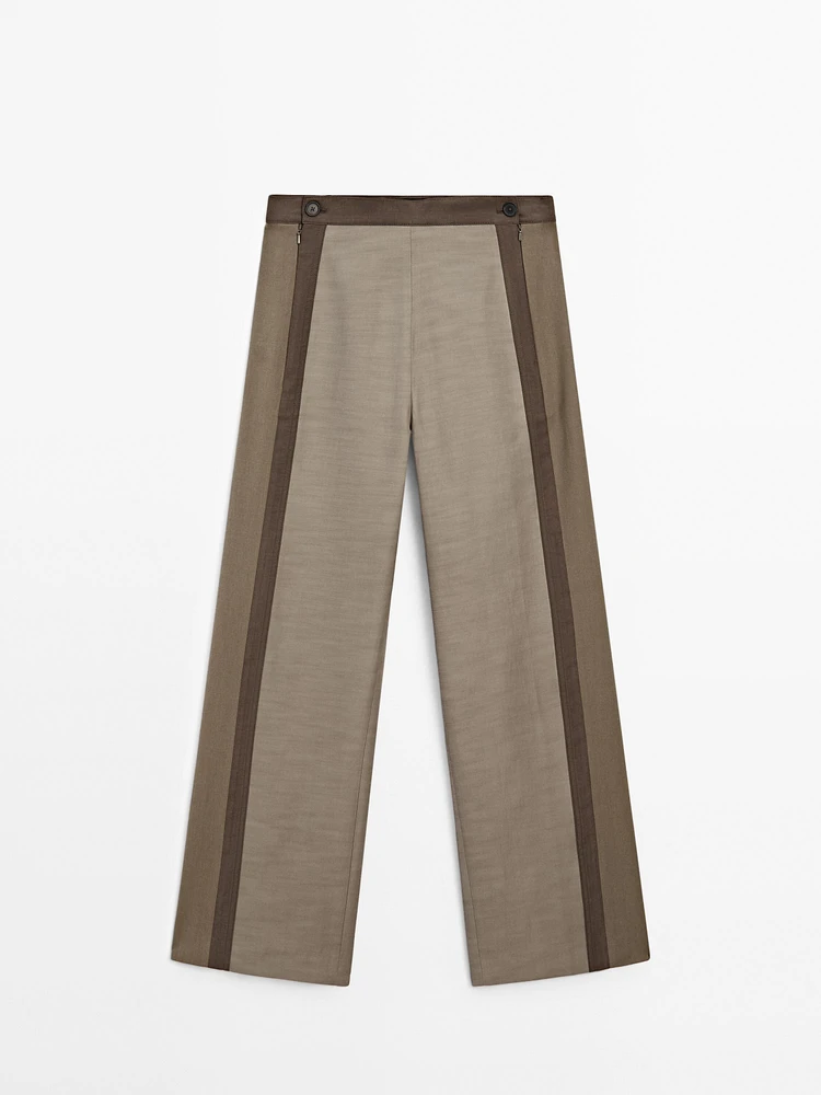 Straight-leg trousers with fastening detail