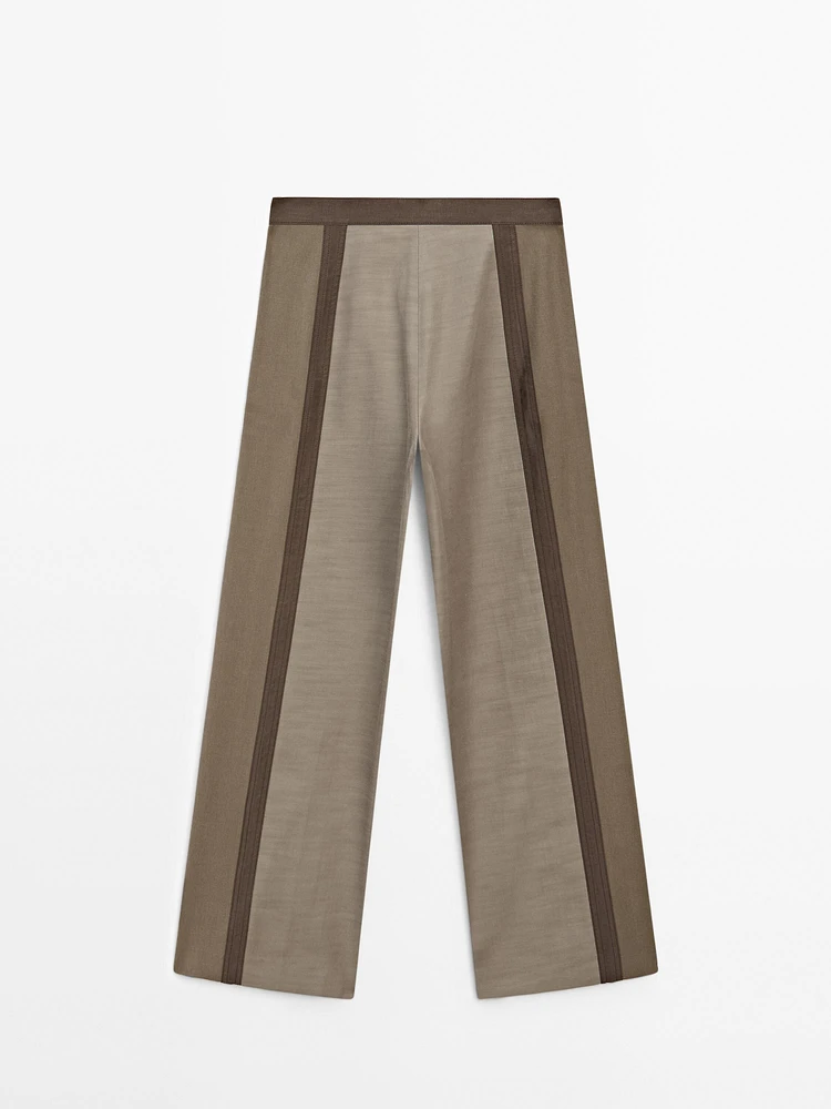 Straight-leg trousers with fastening detail