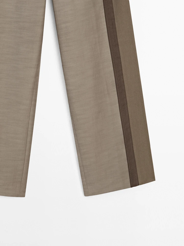 Straight-leg trousers with fastening detail