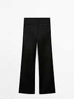 Satin flared trousers with vents