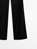 Satin flared trousers with vents