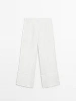 Wide-leg trousers with frayed detailing