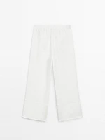 Wide-leg trousers with frayed detailing