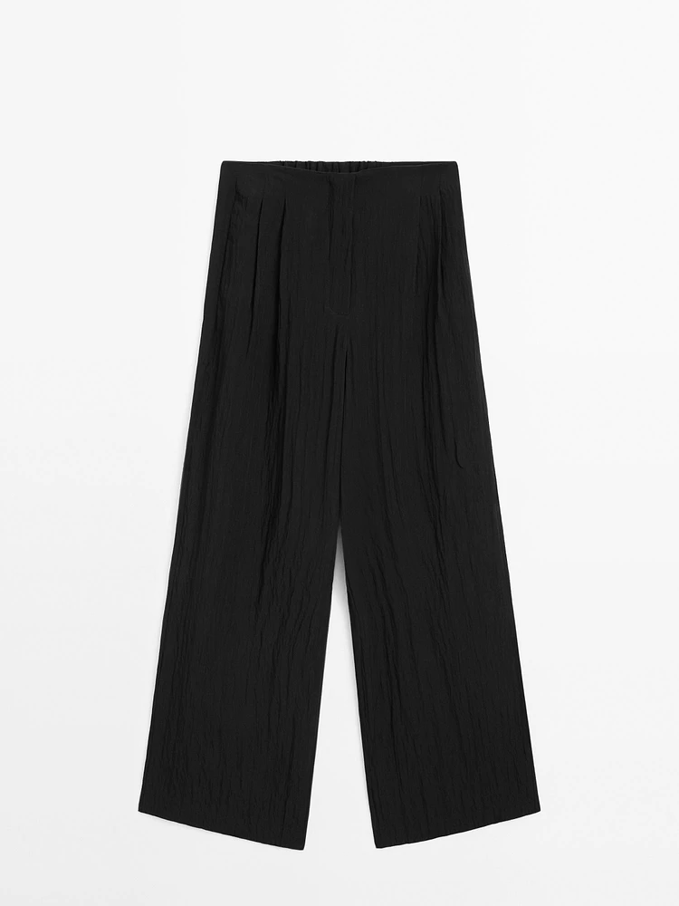 Pantalon technique à pinces