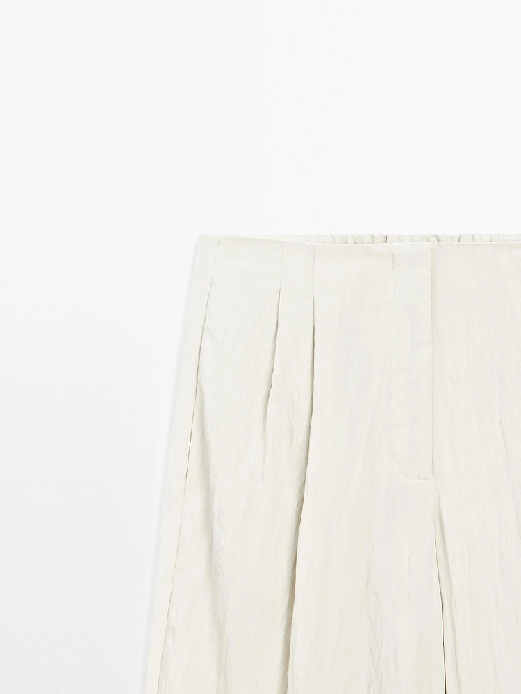 Pantalon technique à pinces