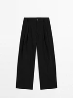 Wide-leg pleated cotton blend trousers