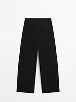 Wide-leg pleated cotton blend trousers