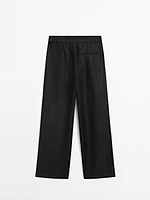 100% linen wide-leg elastic detail trousers