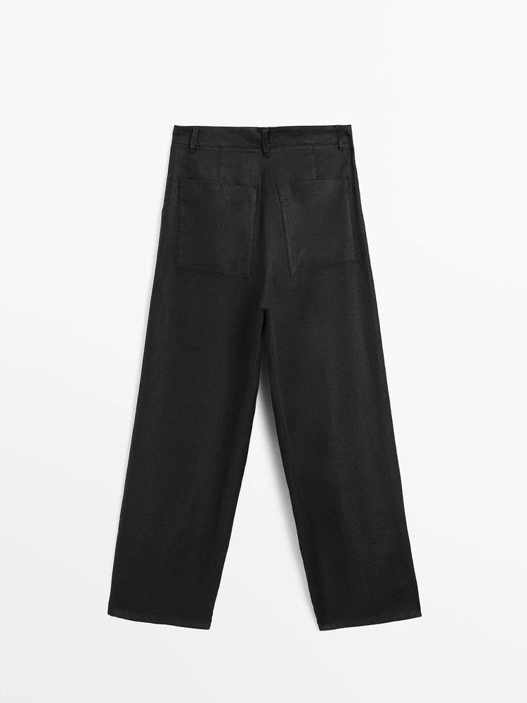 100% linen wide-leg mid-rise trousers