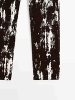 Printed straight-leg mid-rise jeans with flocking