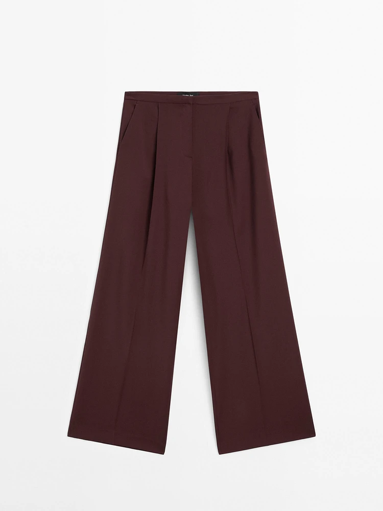 Pantalon à pinces satiné 100 % laine