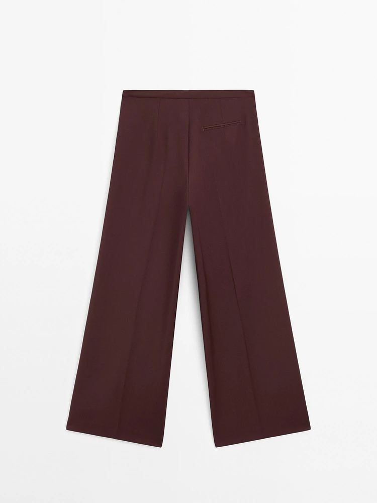 Pantalon à pinces satiné 100 % laine