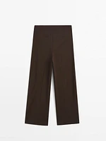 Pleated trousers with a clean design