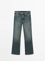 High-waist boot-cut cotton blend jeans