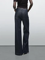 Flared jeans with tie detail