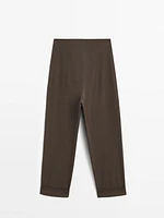 Suit trousers with turn-up hems