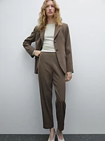 Suit trousers with turn-up hems