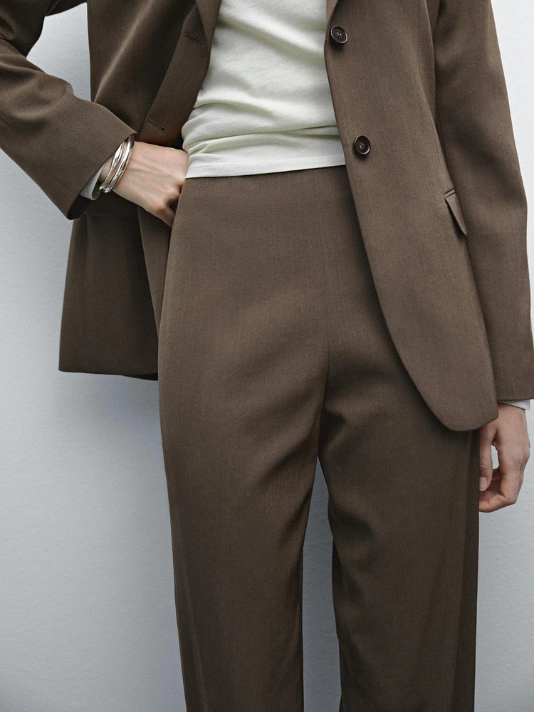 Suit trousers with turn-up hems